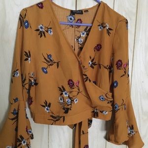 Tempted. Mustard yellow flower top